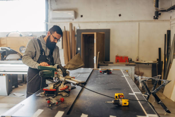 istock A carpenter uses a wood table saw - A perfect tool for woodworking 2080487211