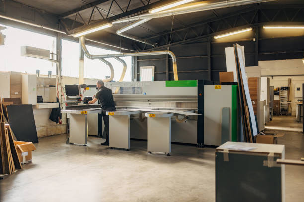 istock An experienced worker makes furniture in the workshop 2080490912