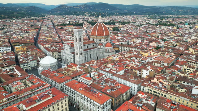 4K Aerial view Real time Footage of Florence Cathedral or Duomo Santa Maria Del Fiore and Florence city which is panoramic view, Florence, Italy