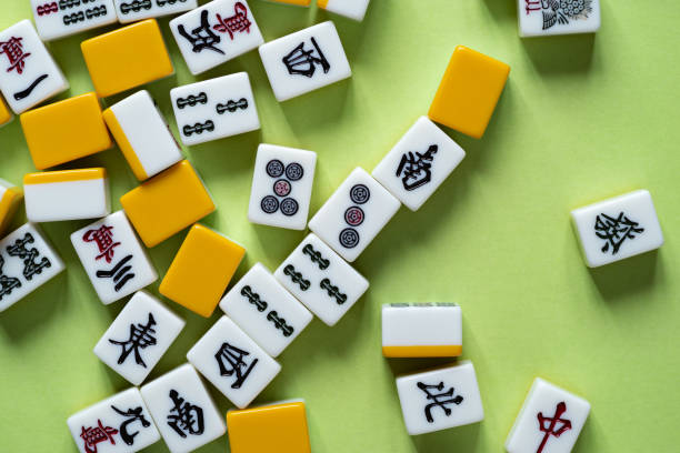 istock mahjong tiles on green background 2080543571