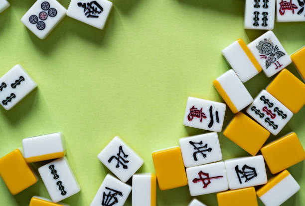 istock mahjong tiles on green background 2080544613