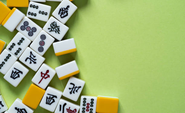 istock mahjong tiles on green background 2080544628