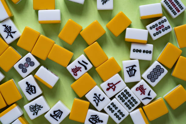 istock mahjong tiles on green background 2080544674
