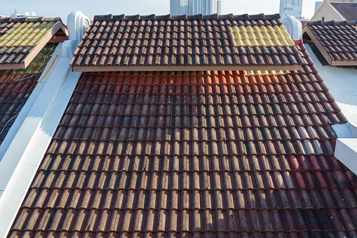 Traditional red clay roof tiles are commonly used in Malaysia. They are known for their durability and ability to withstand the country's tropical climate.