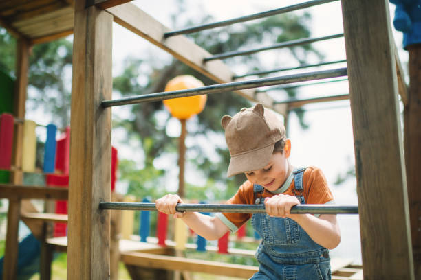 Cute child playing at  playground
