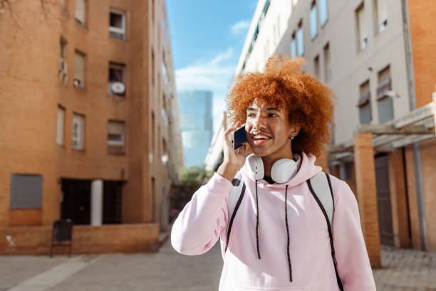 istock Young man talking on the phone 2080674596