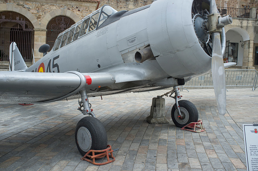 Caceres, Spain - May 27th, 2021: North American Aviation T-6 Texan. Spanish military aviation exhibition. Caceres main square, Spain