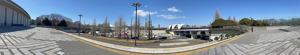 A panoramic photo depicting the scenery of the large plaza at Komazawa Olympic Park, photographed in March 2024, Tokyo, Setagaya Ward, Japan.