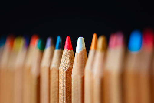 Close up of colorful and pastel crayons
