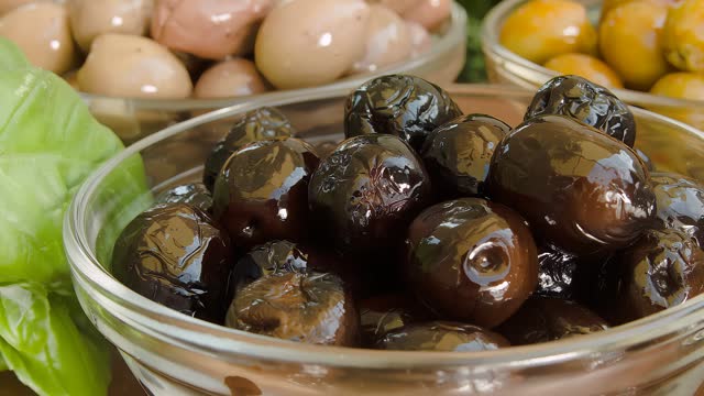 Black olives in glass bowls