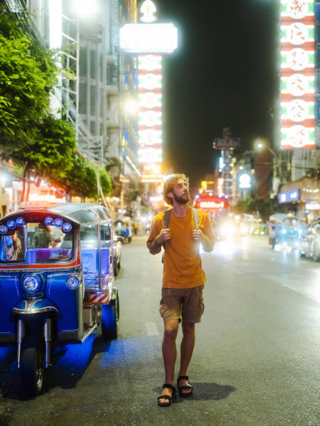 istock Man exploring Chinatown in Bangkok during vacation 2080811009