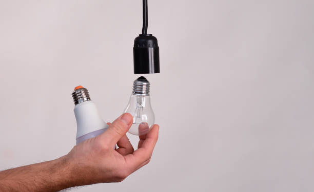 istock led lamp and incandescent bulbs. 2080812863