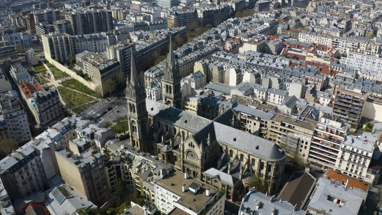 Aerial view circling the Eglise Saint-Ambroise church in sunny Paris, France