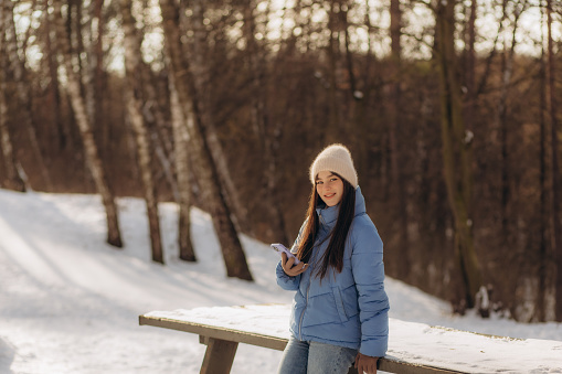 Teenage girl outdoors in winter.