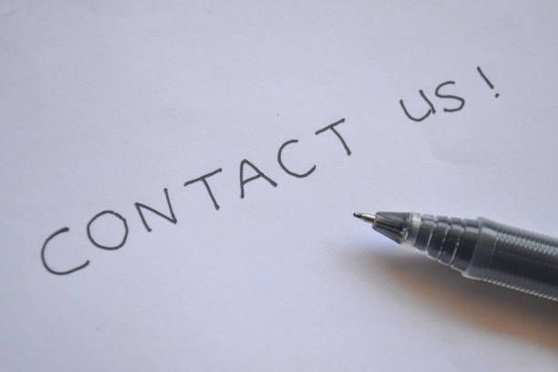 fountain pen with contact us letter on paper