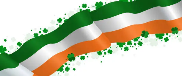 Vector illustration of Waving Irish flag with four leaf clovers banner