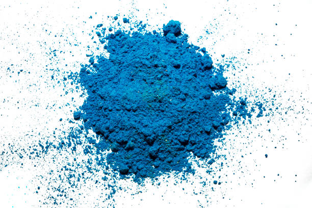 Closeup view of blue Holi powder isolated over a white background. Holi festival concept