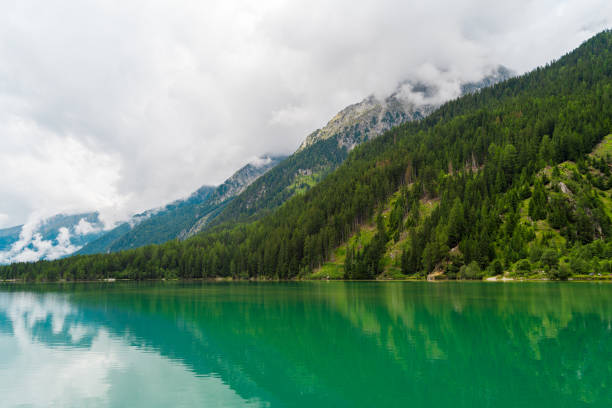 istock Serene Antholzer See Amidst Alpine Mountains on a Cloudy Day 2080904192