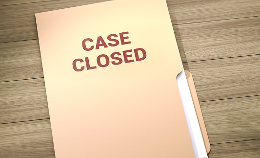 Case Closed File Folder On Wood Table