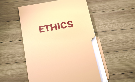 Ethics File Folder On Wood Table