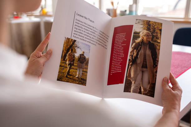 istock Woman reading a magazine at home 2080910493