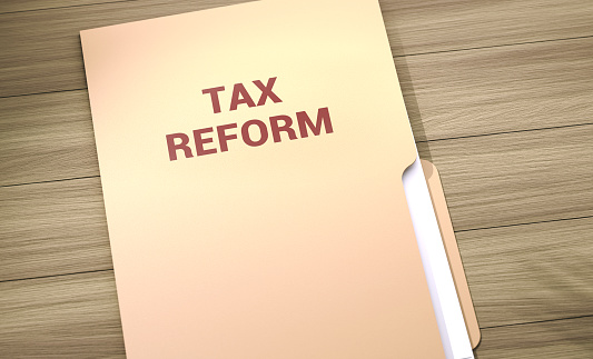 Tax Reform File Folder On Wood Table