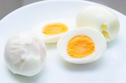 Boiled eggs on white dish