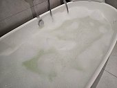 Hot tub full of foam, ready to take a bath