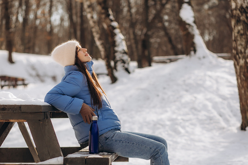 Teenage girl outdoors in winter.