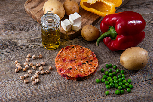 Vegan burger isolated on a woden table