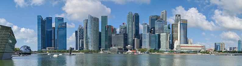 Singapore, June 14, 2019. Aerial view of the famous landmark, Marina Bay Sands in Singapore seen a sunny day. The hotel is shaped like a boat with a large infinity pool on the roof.