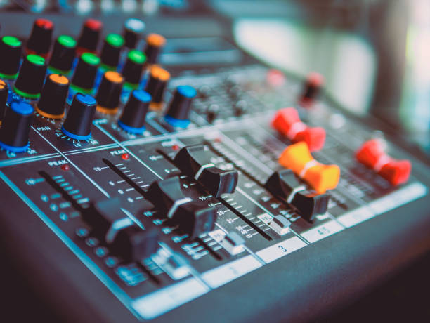istock Close-up of sound recording equipment knobs.Mixer control. Music engineer. Backstage controls on an audio mixer, Sound mixer. Professional audio mixing console, buttons, faders and sliders. sound check. 2080983660