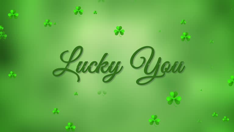 Lucky You. Happy Saint Patrick's Day. Flying clover leaves over green background.