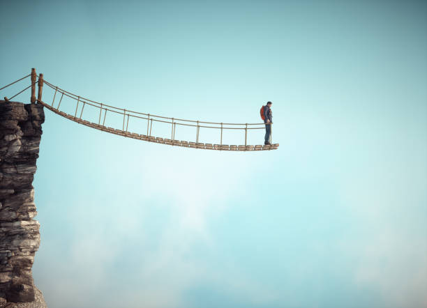 istock Surreal scene with a rope bridge cut in half suggesting the concept of dead end or impossible situation. 2081093044