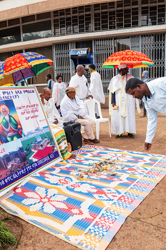 Bahir Dar, Ethiopia - April 21st, 2019: Community raising funds to fix the church during Easter holiday, reflecting the traditions and festive atmosphere of the occasion.