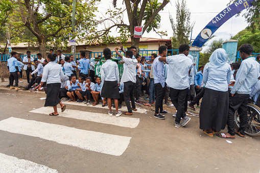 GONDAR, ETHIOPIA, APRIL 22.2019, Ethiopian students in uniform behind Fasiledes secondary school in Gondar City. Gondar, Ethiopia, April 22. 2019