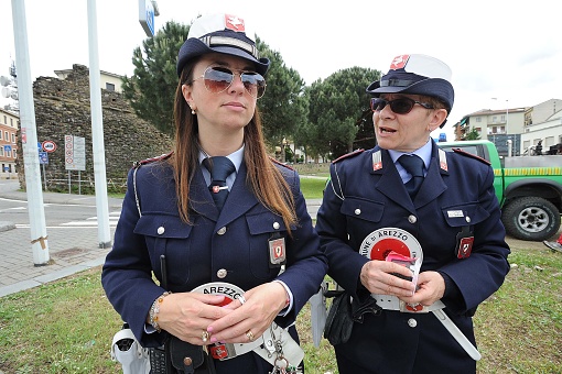 Italian Municipal Police with their patrols and cars direct traffic in the city, intervene in traffic accidents, and issue fines and penalties to motorists who do not obey traffic laws.