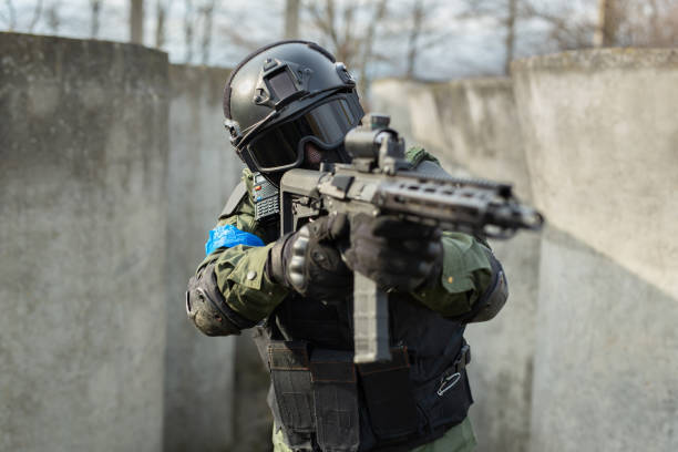 istock Portrait of military special forces with weapons. 2081149718