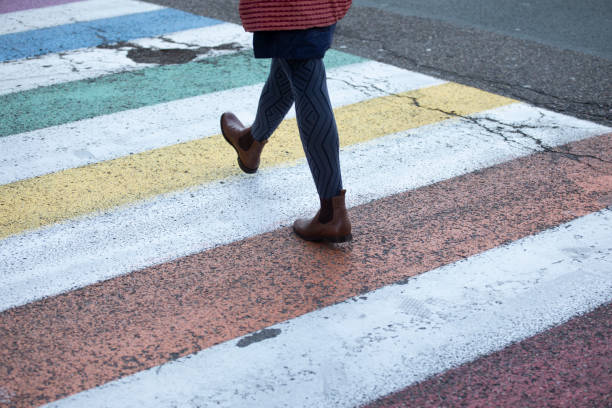 istock Pedestrian walking over a zebra crossing 2081151207