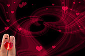 Romantic finger faces background with space for copy
