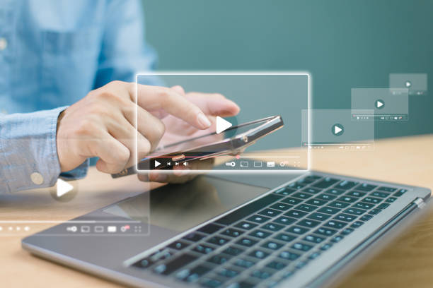 istock Video technology, person touch play button on computer virtual screen to watch online VDO streaming. Study E-learning, graduate certificate program concept. Teacher training online education academy 2081251868