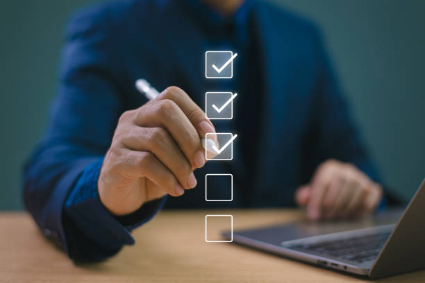 istock Business performance evaluate checklist review, businessman using pen computer online checklist survey, fill check digital report form checklist, assessment, questionnaire, evaluation, online survey 2081267016