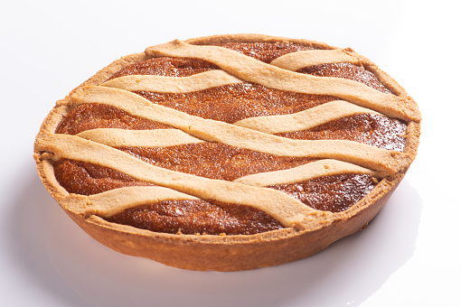 Pastiera napoletana is a typical Easter sweet cake of the area of southern Italy in the Campania region isolated on white background