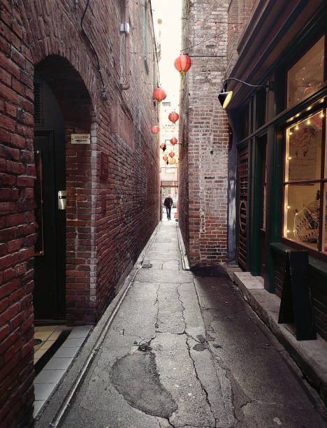 istock View down narrow alley with lanterns 2081335235