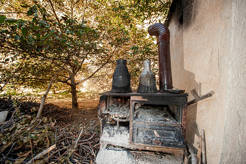 Wood stove in a house with a garden