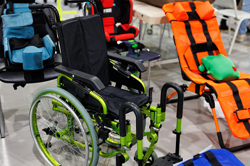 A large selection of strollers for people with disabilities in the store