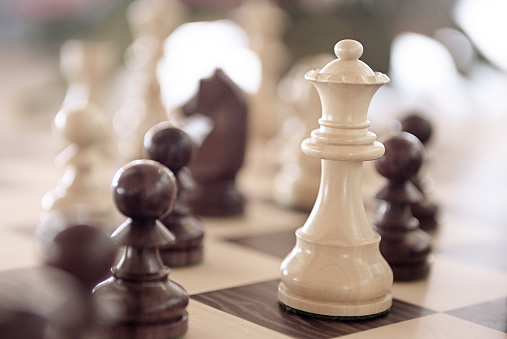 Chess game queen piece closeup shot