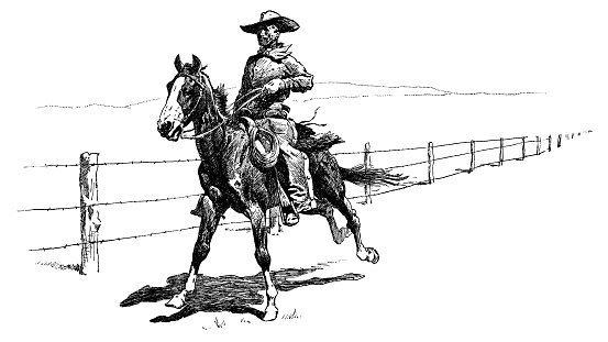 A Mexican ranchero (cowboy) riding along a barbed wire fence making sure it’s secure in Texas, USA. Vintage etching circa 19th century.