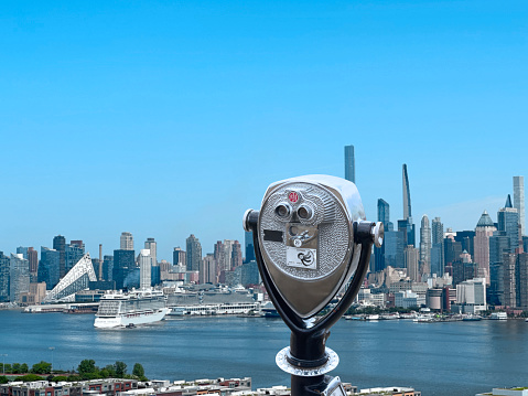 Coin operated binoculars in front of Manhattan view in New York City