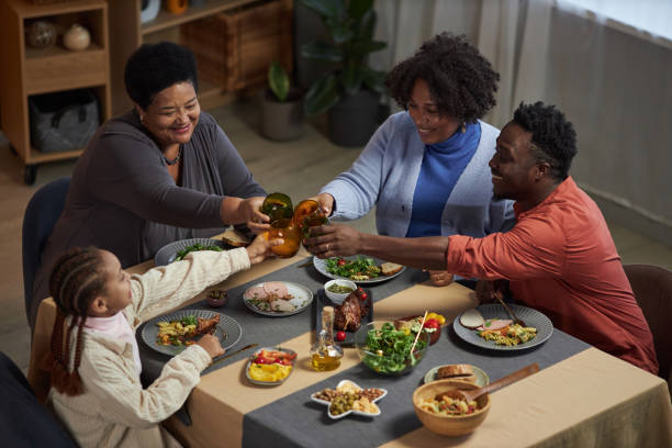 istock Three Generation Family Enjoying Dinner Together 2081375363